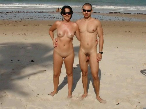 nudistlifestyle:  Lovely nudist couple at the beach !  sunglasses