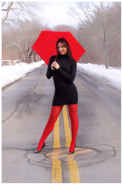 Splash of Color. Curvy girl with colorful legs and high heels.