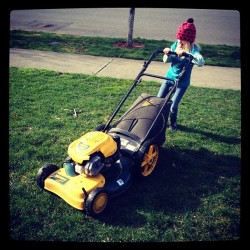 Sophia loves mowing the lawn. (Taken with