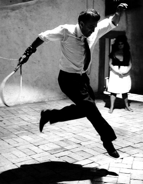 tornandfrayed:Federico Fellini jumping on the set of Otto e Mezzo, 1963. Photo by Tazio Secchiaroli.