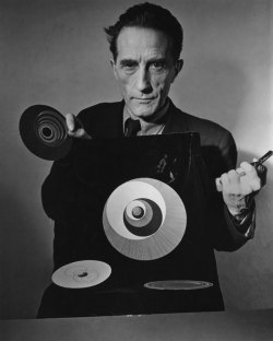 geneseelibby:  Marcel Duchamp with rotoreliefs, from Hans Richter’s film Dreams That Money Can Buy, 1947. 