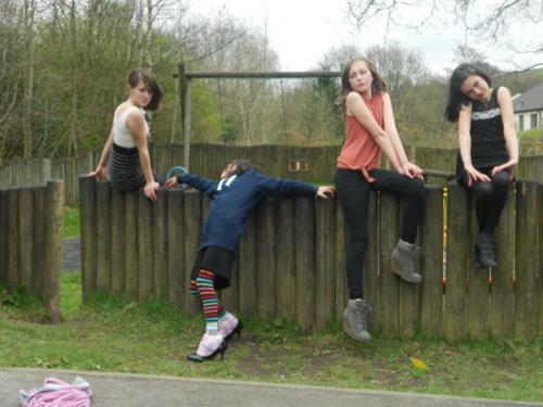 in-dy:  these girls made an album called ‘photo shoot and face masks’ shit i hate facebook     the one in stripey socks just sits in awkward positions 