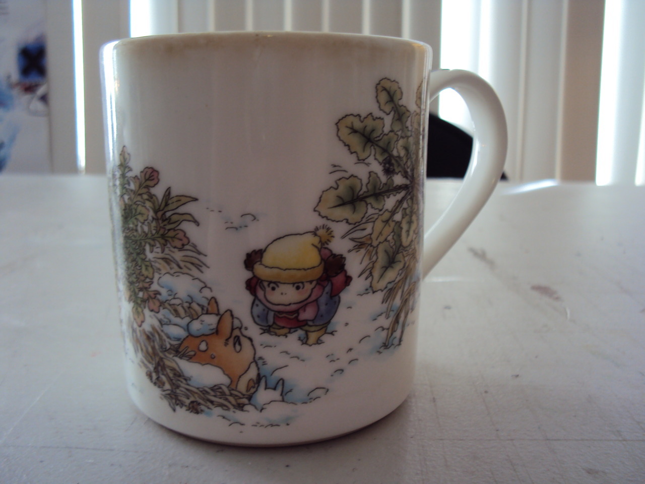 fyeahmiyazaki:  aefergmugblog:  Mug featuring art from My Neighbor Totoro. Purchased