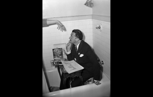 Salvador Dali, Spanish surrealist painter, photographer and filmmaker.In a bathtub.