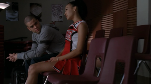 mzminola:Alone in the choir room, Puck tells Santana what happened to his Mohawk. She’s scornful of 