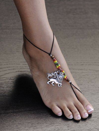 Nerissa Irvings beautiful foot draped in rasta colored foot jewelry!!!