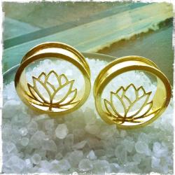 somaticbodypiercing:  1 3/8” gold lotus eyelets, made by Blackheart Jewelry in Long Beach, CA. Support local! These pretties can be seen in our store. 