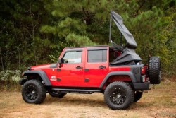 thekhooll:  JK Jeep ® Wrangler, the PowerTop™ Rugged Ridge is excited to announce the first ever electric powered top for the JK Jeep ® Wrangler, the PowerTop™. No more struggling for minutes to get your soft top up when the occasional thunderstorm