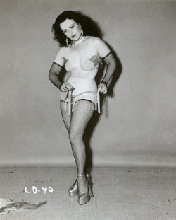 Lili Dawn Removes Her Shimmy Skirt.. From A Larger Photo Series Shot By Irving Klaw..