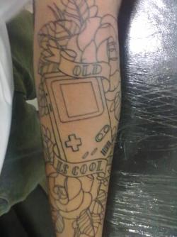 fuckyeahtattoos:  I’m a gamer lover and started play with portable . Also, I like the old style Tattoos. Talking with tattoo artist, he proposed to work in the art and show me her idea. When I saw the art I really like and  started in same day my tattoo.