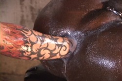 thehappyhole:  Mmmmm.  Hot tattooed arm disappearing into a luscious chocolate hole.  Dig it!