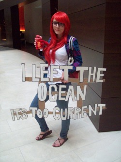 archiemcphee:  Hipster Ariel left the ocean because it’s too current. Ha! That’s some awesome hipster cosplay. Fish tails are probably too mainstream as well. [Photo via Don’t Stand There Gawping] 