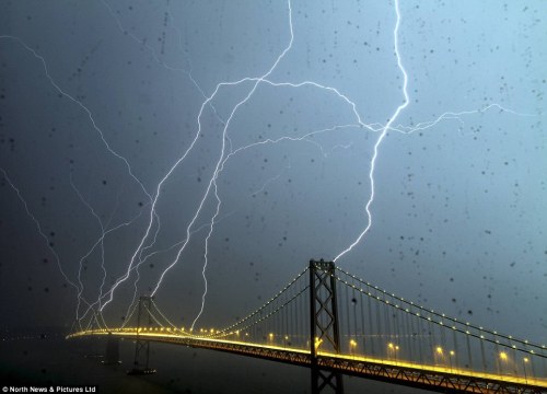 jetpac-app:  Lucky strike! Eight bolts of lightning hit the iconic Bay Bridge in San Francisco in a spectacular once in a lifetime moment captured by photographer Phil McGrew. From Daily Mail  Want to get inspired by more cool travel photos? Check out