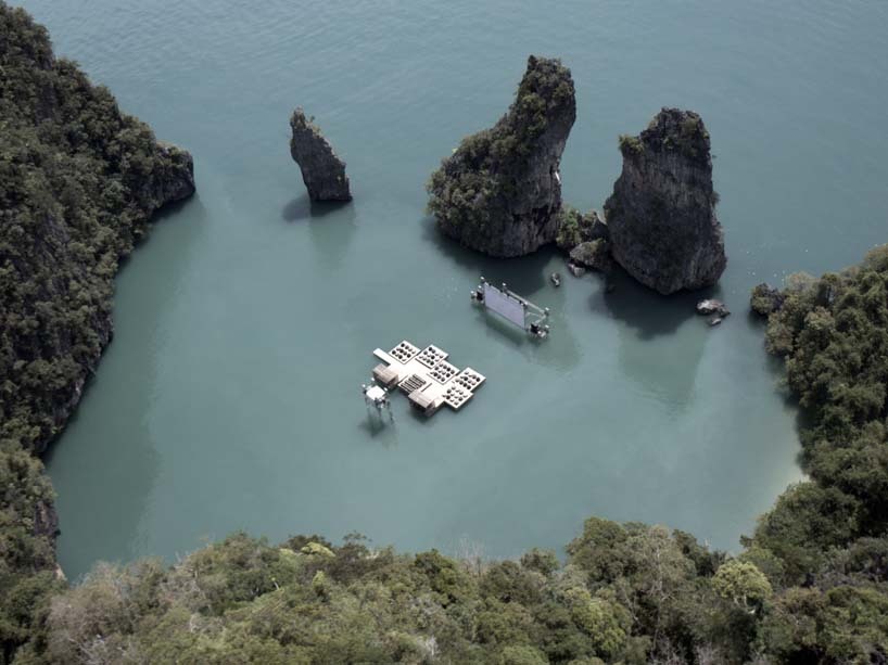 ‘archipelago cinema’ by ole scheeren is a floating cinema which premiered at the inaugural edition of the 'film on the rocks yao noi’ festival in thailand.