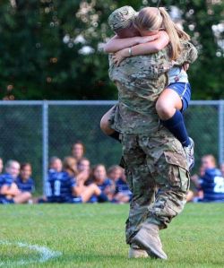 smileforall-them-haterss:  just-imagine-beautiful:   This is my friend, Gabby. Her brother came home in the middle of a soccer game. It was so adorable I cryyed. I am even in the background of this picture. I will reblog this everytime I see this on my