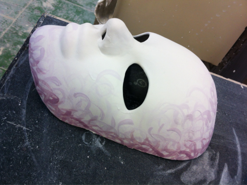 Another Mask Waiting To Be Glazed And Fired.