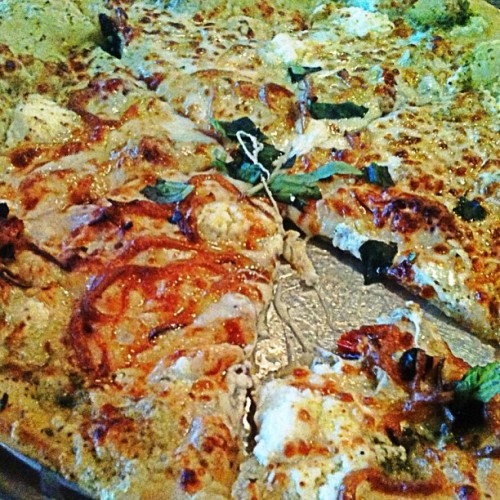 Five cheese basil pesto pizza with sundries tomatoes and artichoke hearts. (Taken with instagram)