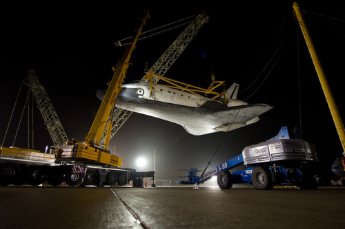 fuckyeahspaceshuttle: #OV103 suspends from sling held by two cranes after demate from NASA 905 at Du