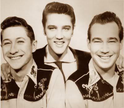 novocainelipstick:  Scotty Moore, Elvis Presley and Bill Black 1954 