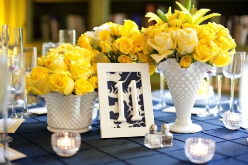 I love this table centre idea for a wedding or special event, the yellow tulips in white glass vases really stand out and look fresh and inviting.