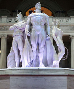 comicscodeauthority-blog-deacti:   A statue featuring superheroes Batman, Superman and Wonder Woman was displayed during a media preview for the Superheroes: Fashion and Fantasy exhibit at the Metropolitan Museum of Art in New York. The exhibit examined