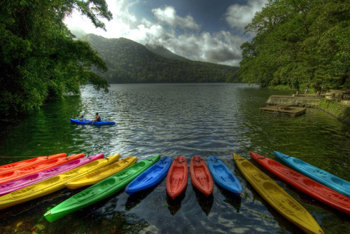 Colorful kayaks at Bulusan Lake, Luzon, Philippines (by Carl James).