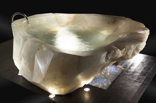 A bath tub cut out of a large single piece of Quartz Crystal.