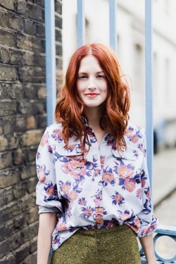 mirnah:  Taylor Tomasi Hill is a true style goddess, and this loosely styled floral-print blouse works wonderfully against her porcelain complexion and flame-red hair.