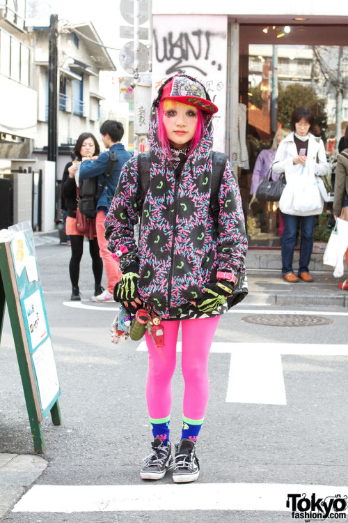 Fun girl w/ pink-&amp;-yellow hair wearing graphic fashion from the Japanese brand Galaxxxy on t