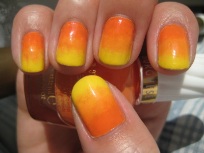 melsimlinails:
“ My first time doing a gradient! I have to admit, the colour choices weren’t the best but it kind of looks like a sunset .. right?! haha
I tried the technique that Talonted used which can be found here.
Started off with my usual Seche...