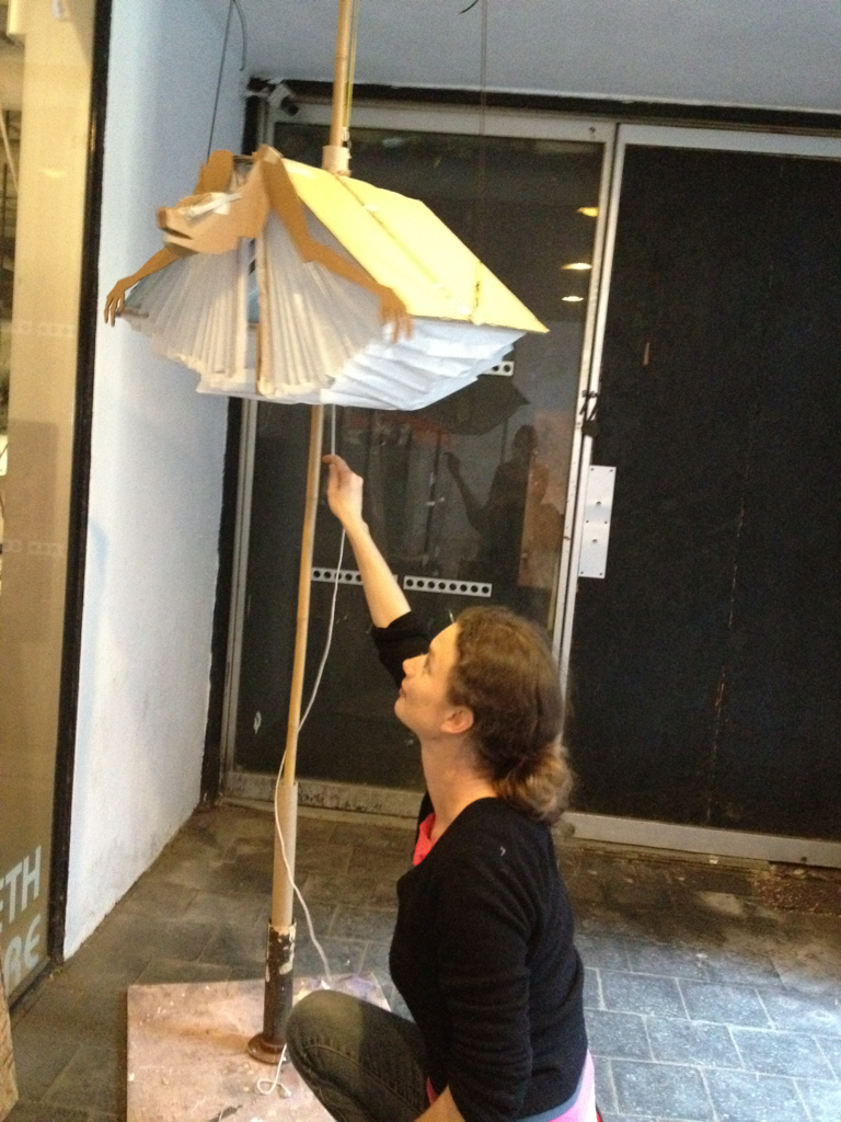 Sophia demonstrating a book bat at the giant puppet workshops at Westbeth!