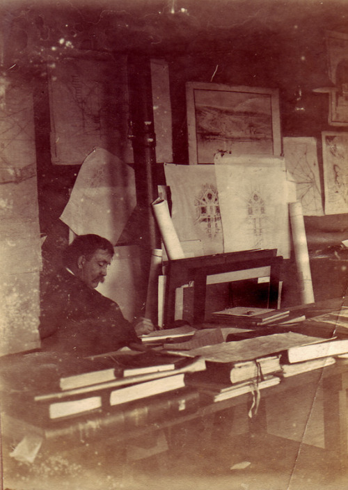 Daniel Burnham working on the Plan of Chicago at his desk, c.1908, Chicago.