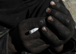  Afghan man smokes after using drugs, Jan