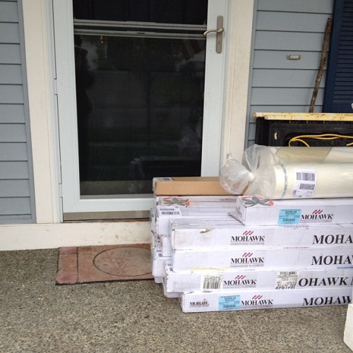 Costco delivered our hardwood floors today. Right IN FRONT of the door. So I have to restack everything so I can open the front door to get it in the house. Thanks non thinking delivery guys! (Taken with instagram)