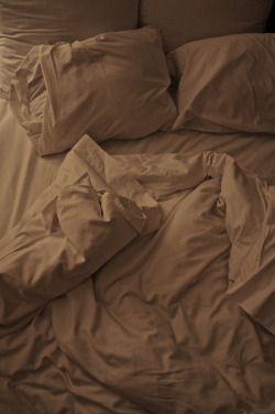 cityparkdog:  I call photos like this “bed porn.”  I find them to be strangely erotic.  The suggestion of what has happened or maybe is still about to happen (easier to imagine that with photos of made beds).  Or maybe nothing has happened other