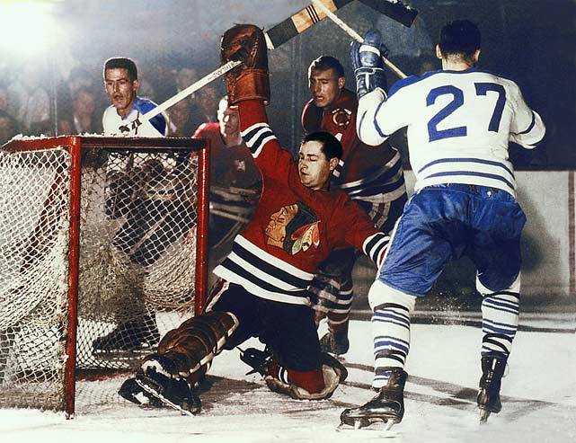 Blackhawks goalie Glenn Hall makes a save during a... - SI Photo Blog