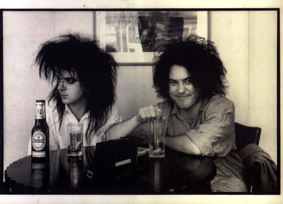 Simon Gallup and Robert Smith  partying 1985