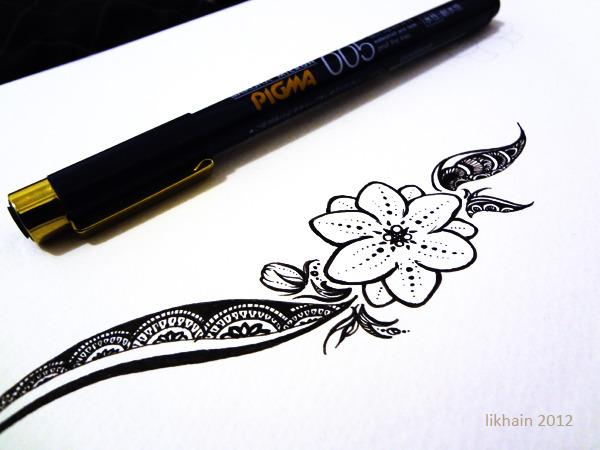 Likhain — [Image: in black ink on white paper, a tattoo...