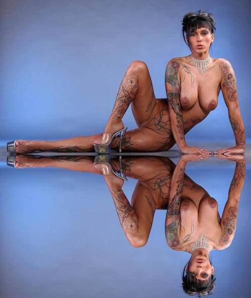 Obsessed by piercings and tattoos adult photos