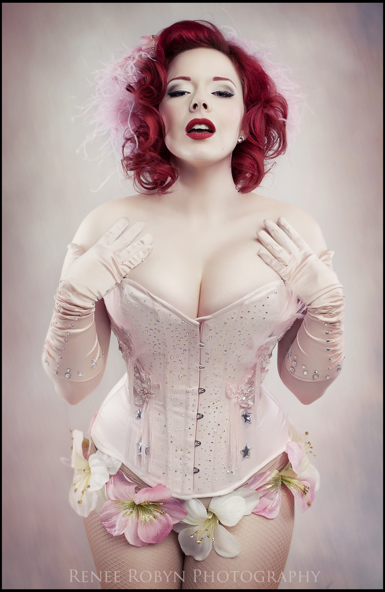 sweetcarouselcorsetry:  Lucky L’Amour in a light pink burlesquey corset I made