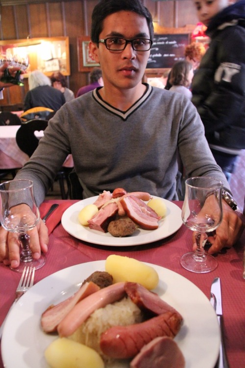 Strasbourg, France.  Enjoying some typical Alsacian cuisine: choucroute.  It’s kind of like Fr