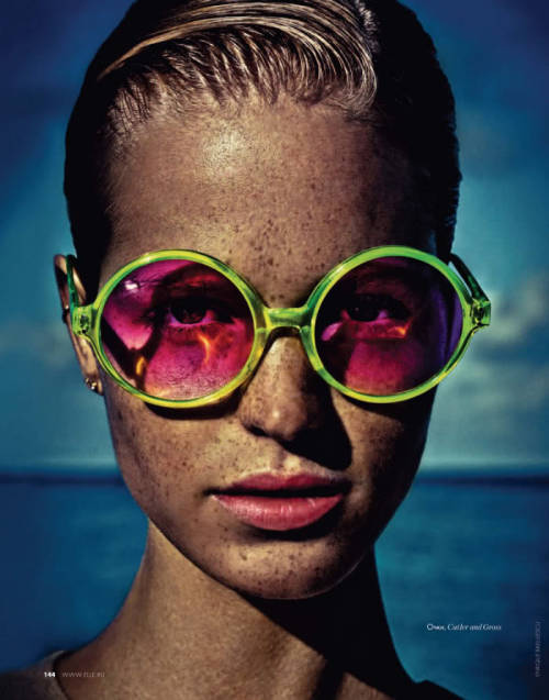 Erin Heatherton photographed by Enrique Badulescu in super saturated sunglasses for Elle Russia.