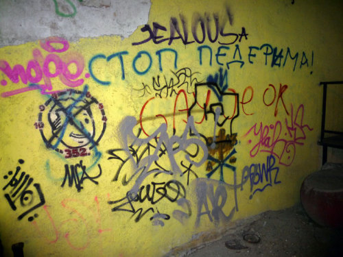 Homophobic graffiti commonly seen on the streets of Belgrade