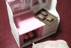 マ