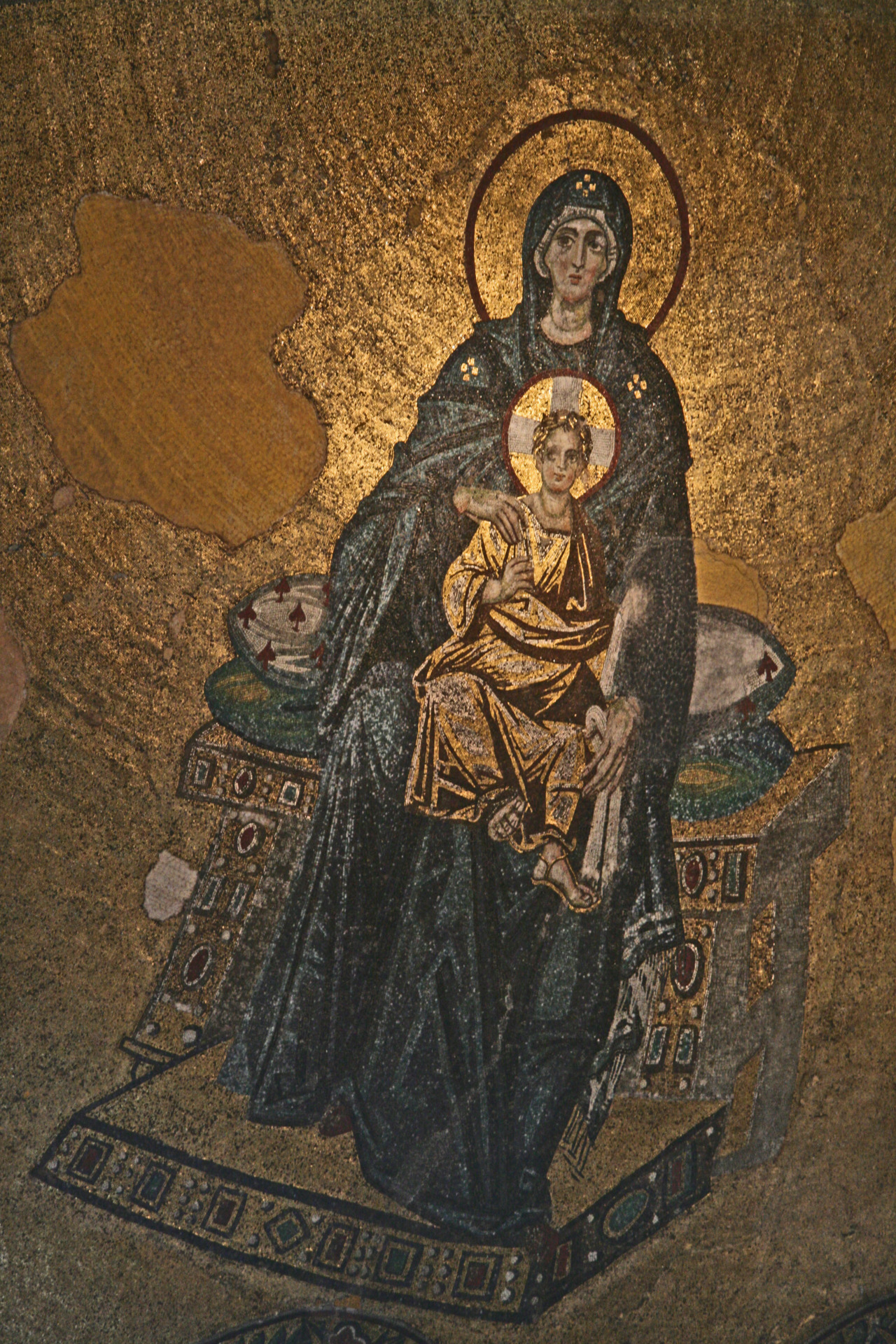 “Theotokos enthronos” and the Child Jesus; Virgin Mary depicted sitting in a