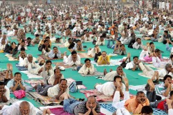 inothernews:  WHATCHA DOIN’?   Participants practiced yoga during Baba Ram Dev’s free yoga camp in Gwalior, India, on Friday.  (Photo: Sanjeev Gupta / EPA via The Wall Street Journal) 