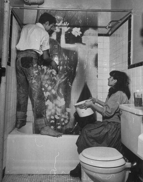 images1234:Robert Rauschenberg and Susan Weil washing artwork with a peroxide solution to fix the im
