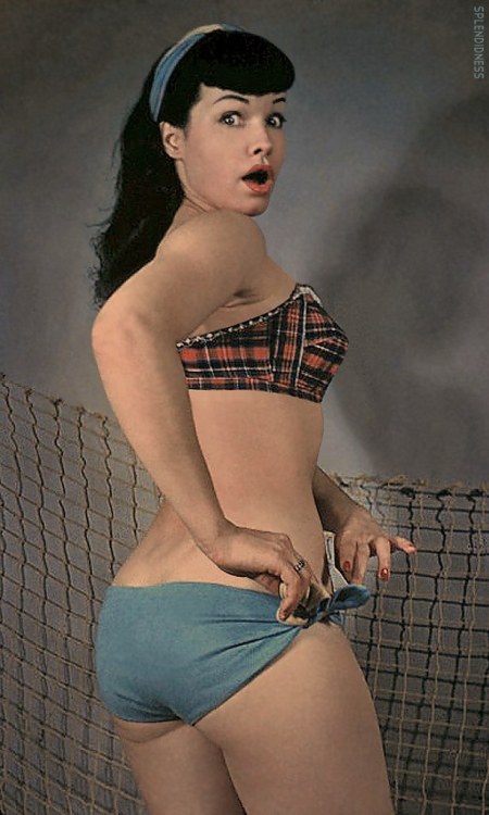 grapnel:Betty Page in bikini, beside a net.