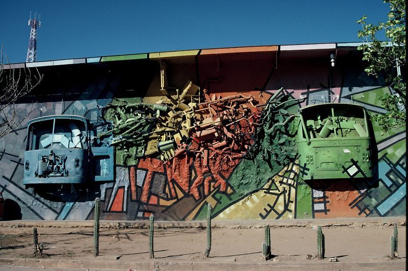 Bus Station Art 12" x 8" digital print Coro Venezuela This is a 12" x 8" borderless digital print of a photograph called “Bus Station Art”. It was taken at the bus station in Coro, Venezuela. Parts of old buses had been cut up and colourfully painted...