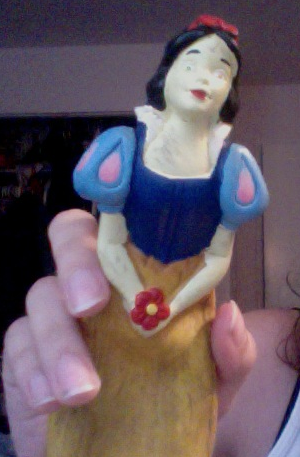  so i found this old snow white squeaky toy sort of item in my attic it kinda creeps me out until i do this  